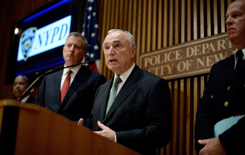 New York City Police Commissioner William J. Bratton (C) talks while New York City Mayor Bill de Blasio (L) and NYPD Chief of Department James P. O'Neill (R) listen during a press conference about last night's shooting death of New York City police officer Randolph Holder in New York, New York, USA, on 21 October 2015. 