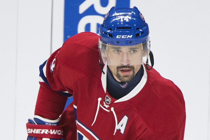 Montreal Canadiens' Tomas Plekanec skates during the warm up prior to an NHL hockey game against the Chicago Blackhawks in Montreal, Friday, September 25, 2015.