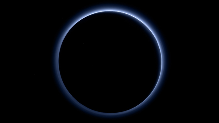 Pluto's blue haze. This image was generated by software that combines information from blue, red and near-infrared images to replicate the color a human eye would perceive as closely as possible.