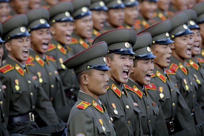 North Korean soldiers parade in Pyongyang, North Korea, Saturday, Oct. 10, 2015.