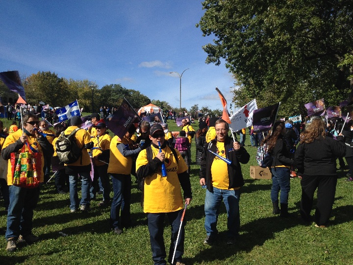 Thousands of public sector workers strike in Montreal, Sunday, October 3, 2015.