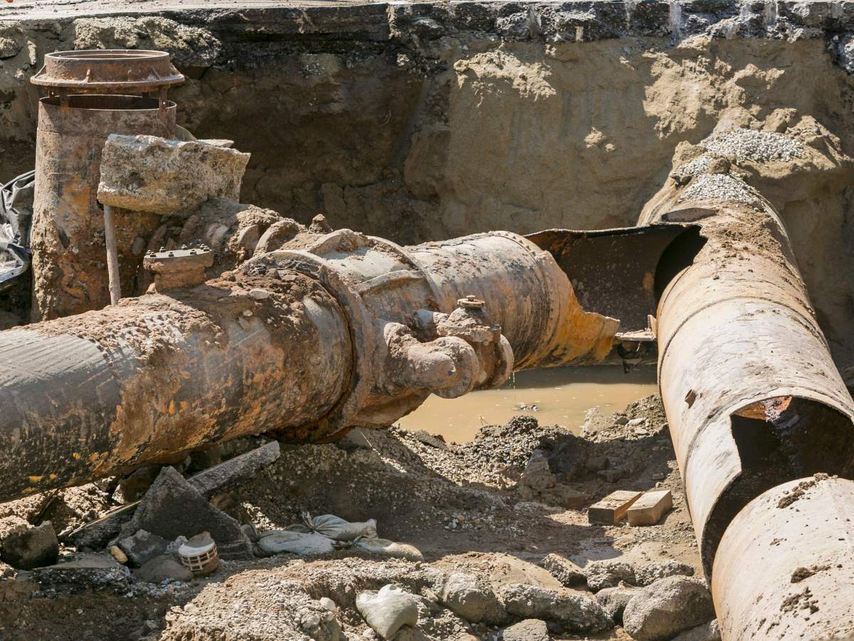  In this July 31, 2014, file photo, a "Y"-shaped juncture connecting two main trunk lines that ruptured is seen on Sunset Boulevard in Los Angeles. Work crews stopped the last of the water gushing from a 30-inch pipe some 30 hours after it burst and flooded a large area of nearby UCLA.
