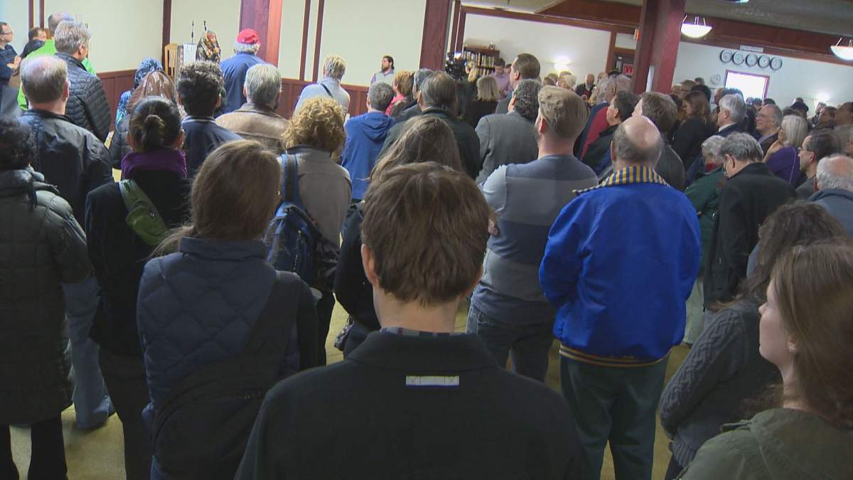 Around 200 people crowded into the Central Mosque on Ellice Avenue for the "My Canada Includes Muslims" rally.