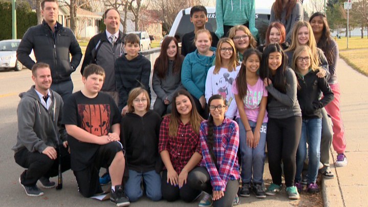 Leadership students from James L. Alexander School pose for a picture after donating hundreds of non-perishable food items to the Saskatoon Food Bank.