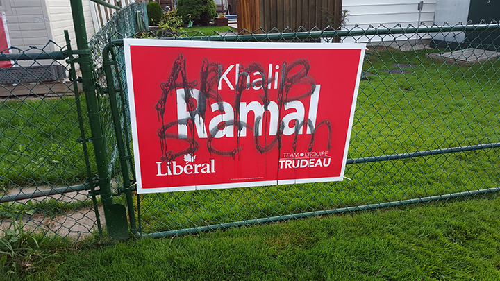 A photo of one of Khalil Ramal's election signs defaced with ethnic slurs on Oct. 7, 2015.