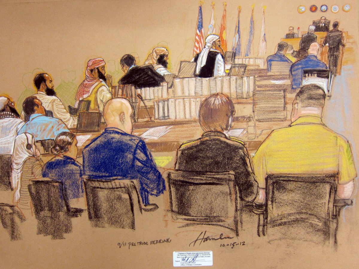 This photo of a sketch shows the five Guantanamo prisoners charged in the Sept. 11 attacks, back row from left, Mustafa Ahmad al-Hawsawi, Ali Abd al-Aziz Ali, Ramzi Binalshibh, Walid bin Attash and the alleged mastermind Khalid Sheik Mohammed, attend their Military Commissions pretrial hearing in the Guantanamo Bay U.S. Naval Base in Cuba, Monday, Oct. 15, 2012.