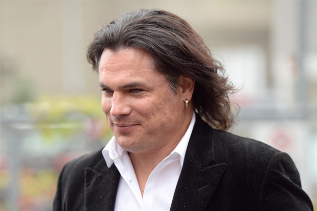 Sen. Patrick Brazeau is back in the upper chamber and says someone must be held accountable for "false" spending accusations against him.