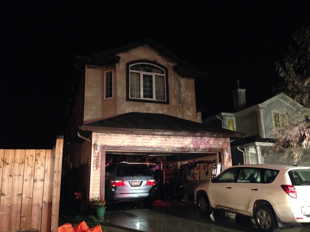 A home at 7931 2nd Avenue in Edmonton's Ellerslie area was heavily damaged by fire on Friday night. October 30, 2015.