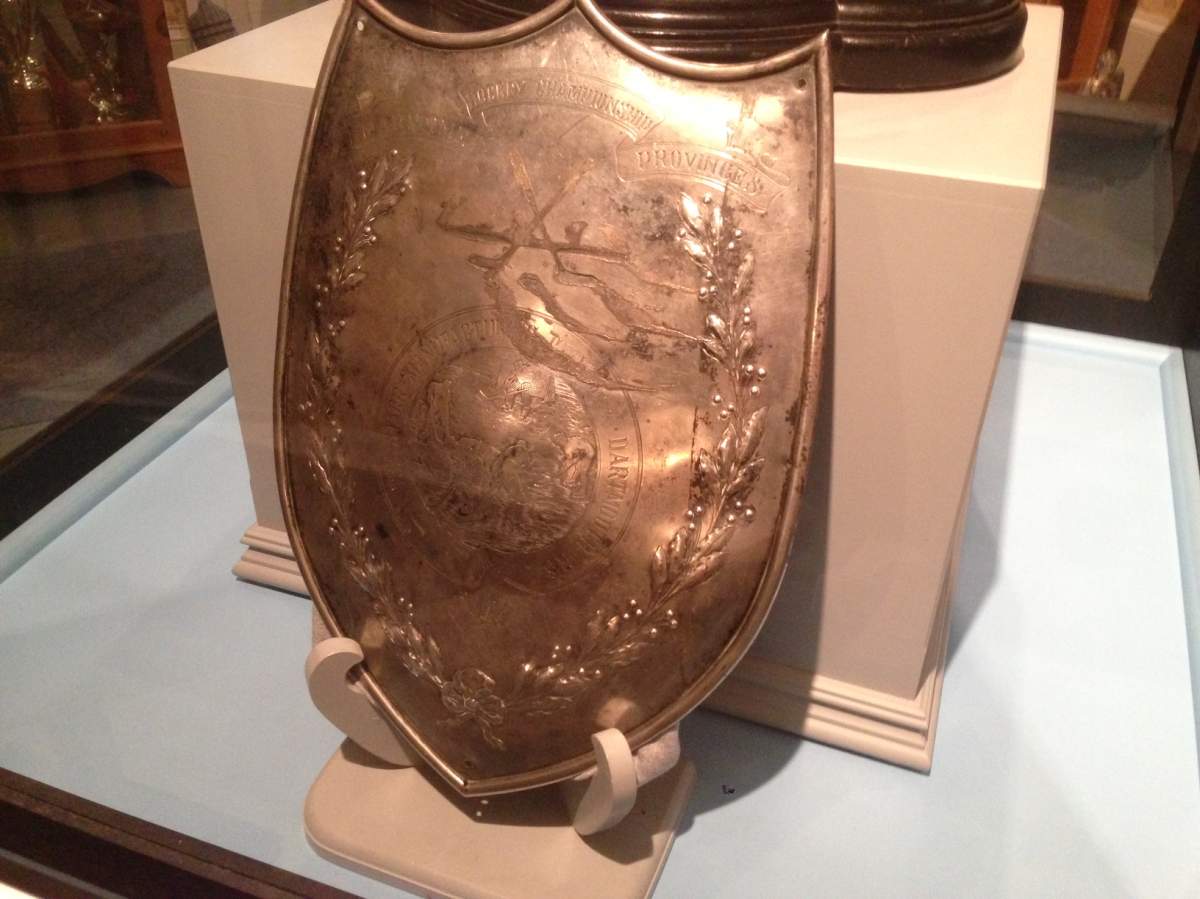 Though damaged by fire, the Starr Shield trophy still has some of its etchings.