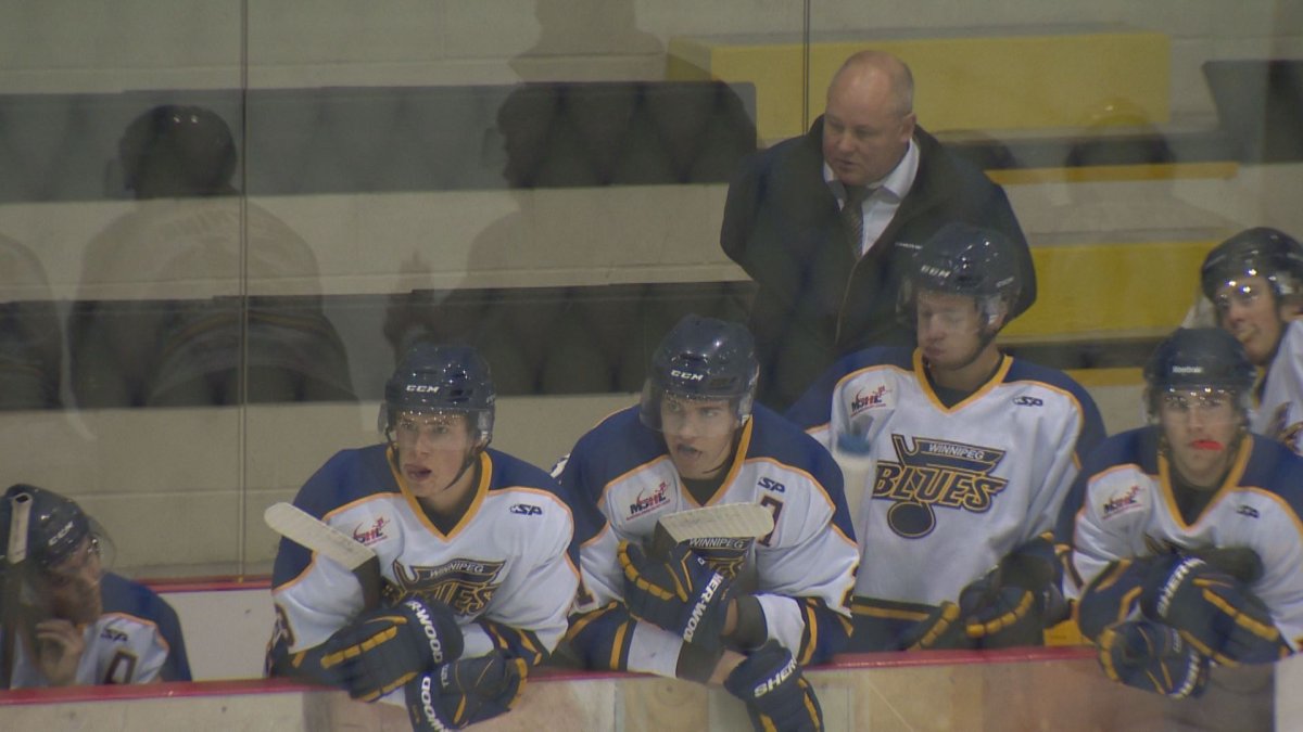 Winnipeg Blues players look on during a game in the MJHL.