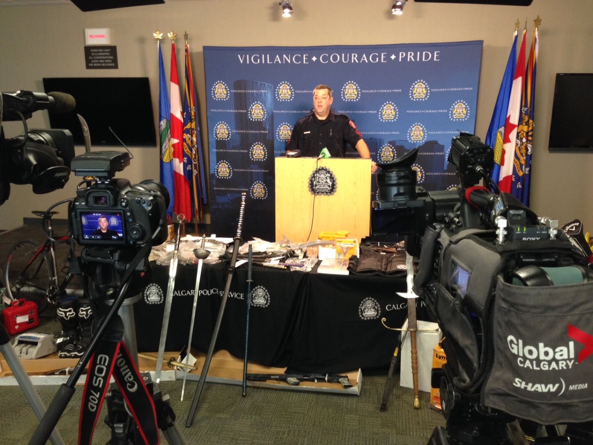 Calgary police showcase a number of weapons seized from a northeast home. 