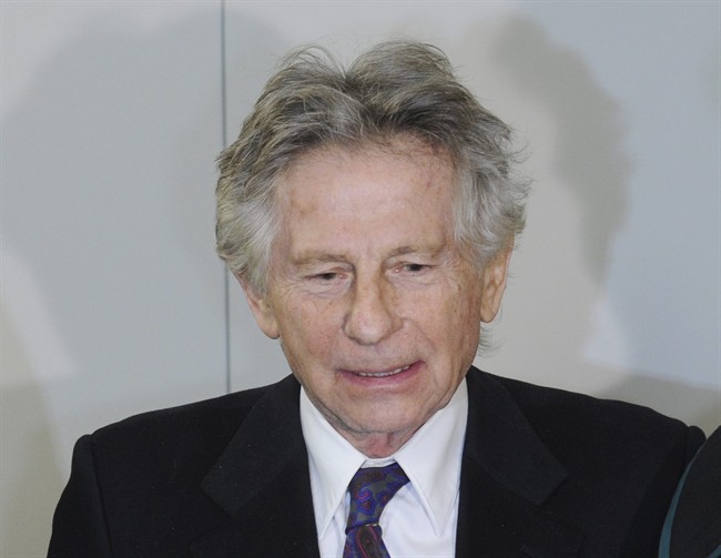 In this Wednesday, Feb. 25, 2015 file photo director Roman Polanski speaks to the press after a hearing concerning a U.S. request for his extradition over 1977 charges of sex with a minor, at the regional court in his childhood city of Krakow, Poland. 