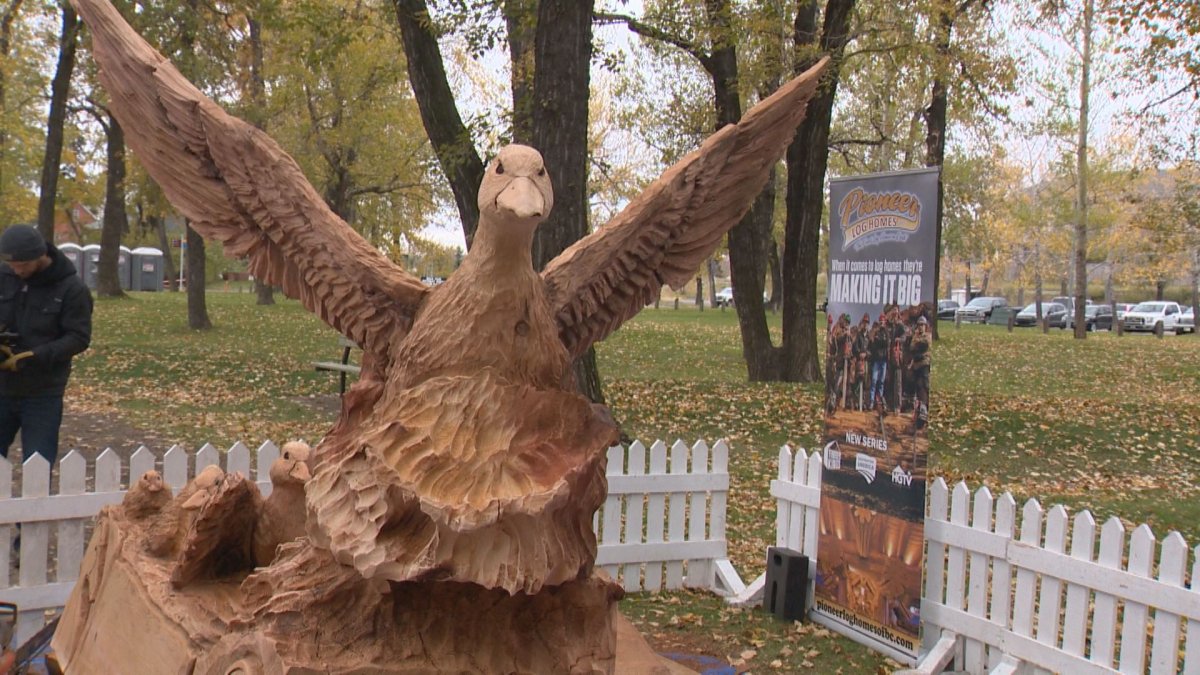 Wood carvers erect large tribute to wetlands at Ducks Unlimited 'Rescue our Wetlands' kickoff. 