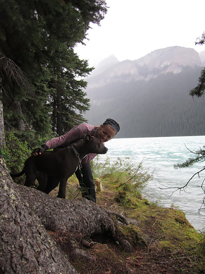Whitney Stinson with her dog Brüun.