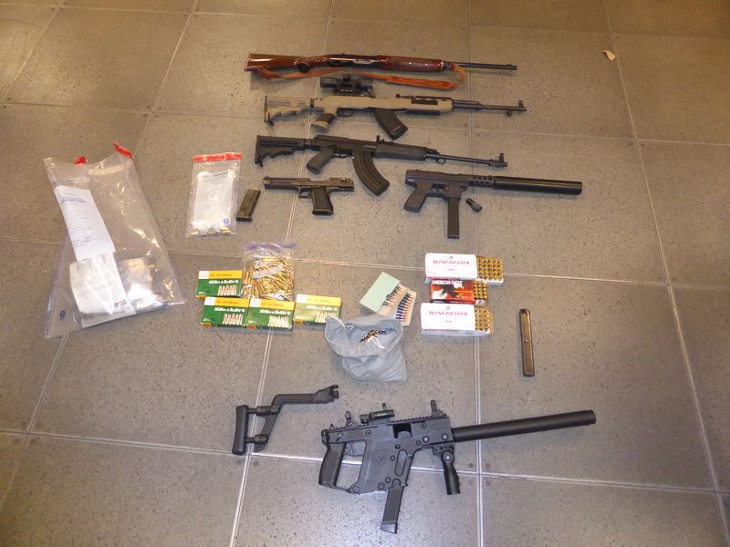 Toronto police seized six semi-automatic firearms along with dynamite and drugs during a raid in downtown Toronto Sunday.