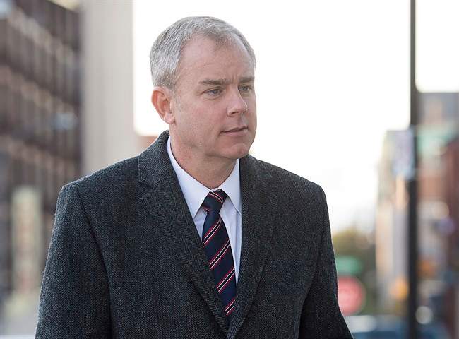 Dennis Oland arrives at the Law Courts as his murder trial continues in Saint John on Wednesday, October 21, 2015.