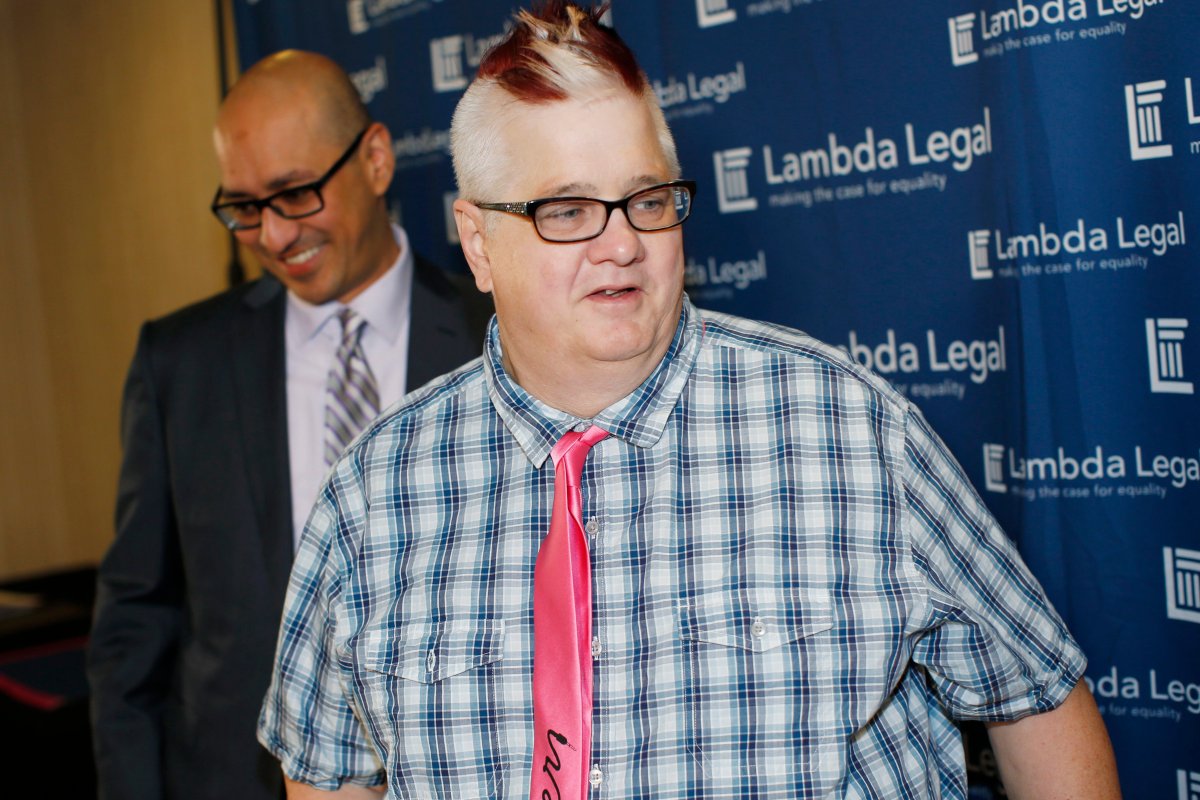 Dana Zzyym, right, the plaintiff in a federal discrimination lawsuit filed by Lambda Legal against the U.S. State Department seeking more gender options for passports, is followed by Paul D. Castillo, staff attorney in the South Central Regional Office of Lambda Legal .