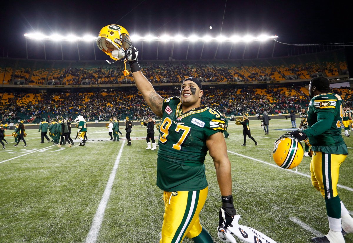 Eddie Steele celebrates after helping the Edmonton Eskimos win the CFL West Division final against the Calgary Stampeders on Nov. 22, 2015.