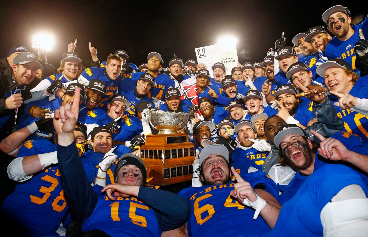 UBC Thunderbirds players celebrate after defeating the Montreal Carabins at the Vanier Cup Saturday, November 28, 2015 in Quebec City. 