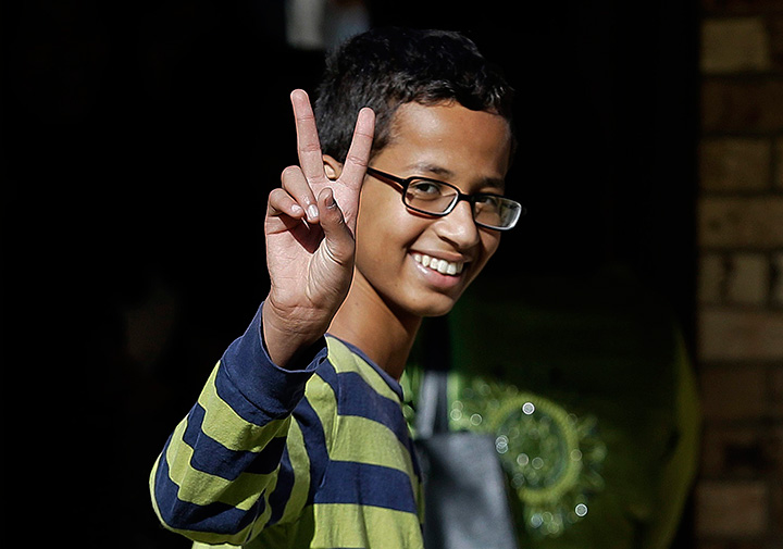 This Sept. 17, 2015 file photo shows Ahmed Mohamed, 14, gestures as he arrives to his family's home in Irving, Texas.  