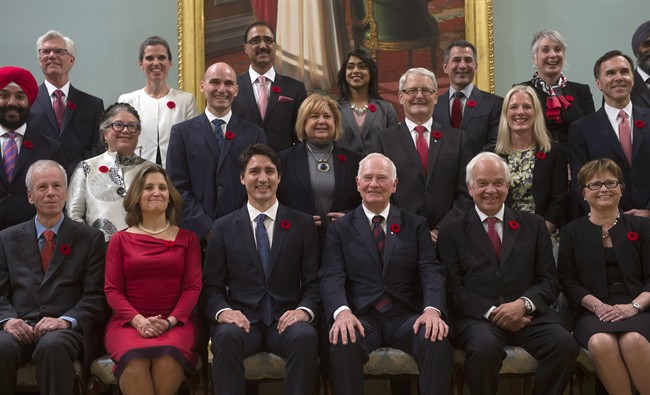 Governor General David Johnston (third from right) and Prime Minister Justin Trudeau (third from left) with members of Canada's first gender-equal cabinet, after they were sworn in in November 2015.