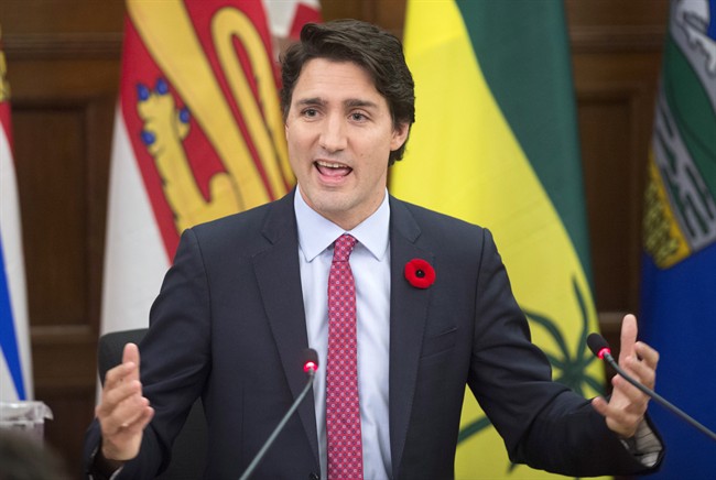 Prime Minister Justin Trudeau delivers some opening remarks at the start of caucus, Thursday, November 5, 2015 in Ottawa. THE CANADIAN PRESS/Adrian Wyld.