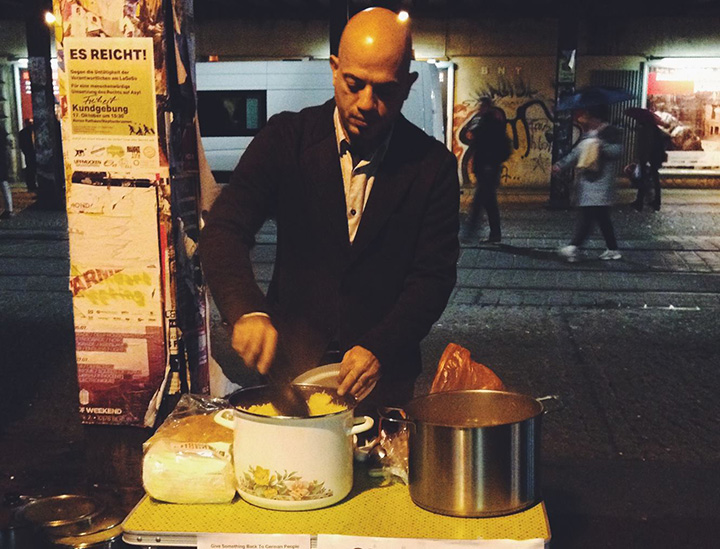 Alex Assali sets up a food station where he dishes out warm meals to the Berlin’s homeless. 