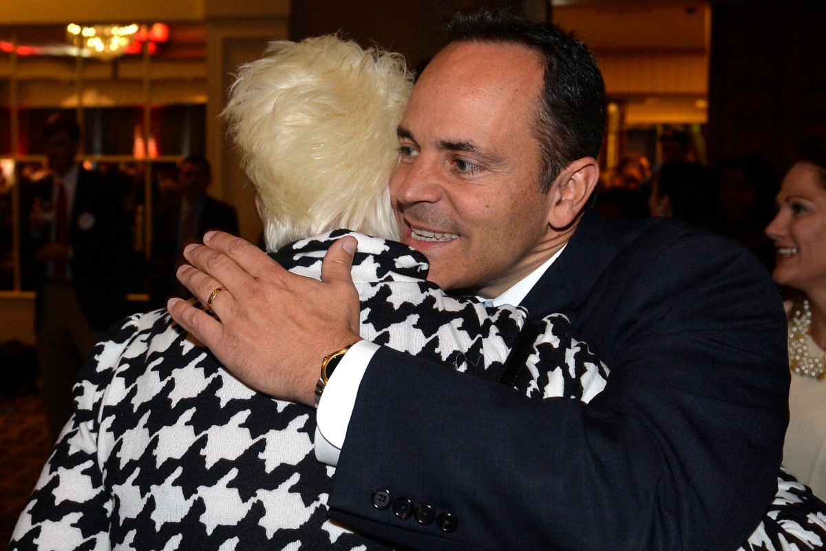 Kentucky Republican gubernatorial candidate Matt Bevin, right, hugs one of his supporters at the Republican Party celebration Tuesday, Nov. 3, 2015, in Louisville, Ky.  Bevin defeated Democrat Jack Conway to become only the second Republican governor in the state in four decades. 