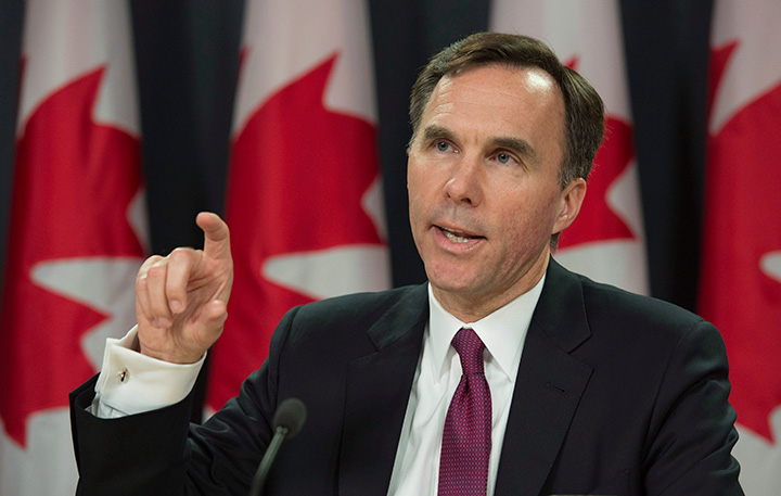 Minister of Finance Bill Morneau speaks to media as he delivers a fiscal update during a news conference, in Ottawa, on Friday, Nov. 20, 2015. 