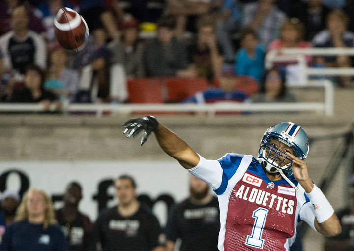 Montreal Alouettes' quarterback Brandon Bridge throws a pass during a CFL football game against the Ottawa Redblacks in Montreal, Thursday, June 25, 2015.