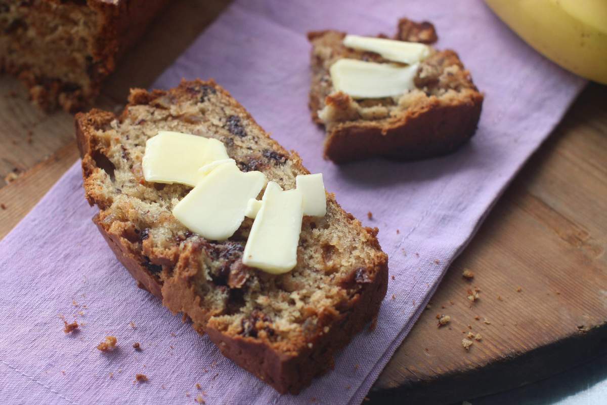 This July 27, 2015 photo shows butter on banana bread with chocolate and crystalized ginger in Concord, N.H. This dish is from a recipe by Katie Workman.