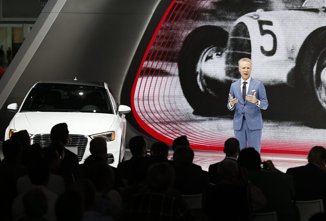 Scott Keogh, president of Audi of America, speaks at a news conference alongside an Audi A3 Sportback e-tron during the Los Angeles Auto Show Wednesday, Nov. 18, 2015, in Los Angeles.