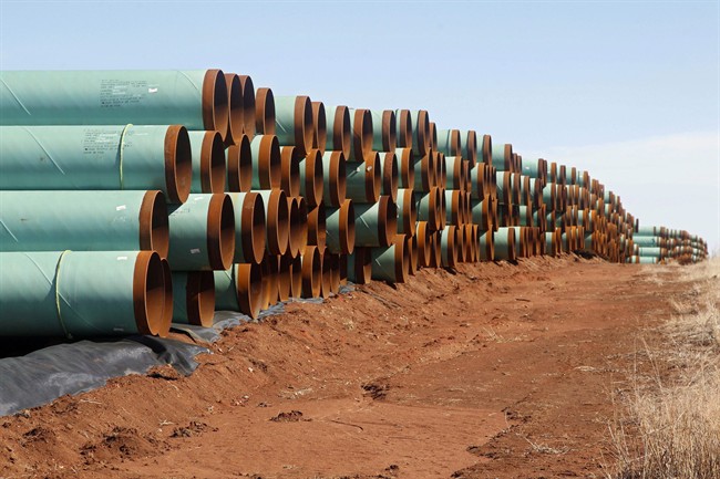 Pipe for the Canada-to-Texas Keystone XL pipeline are stacked in a field near Ripley, Okla., in this Feb. 1, 2012 file photo.
