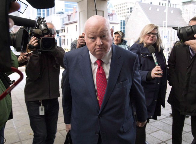 Sen. Mike Duffy, a former member of the Conservative caucus, arrives at the courthouse in Ottawa on Nov. 19, 2015.