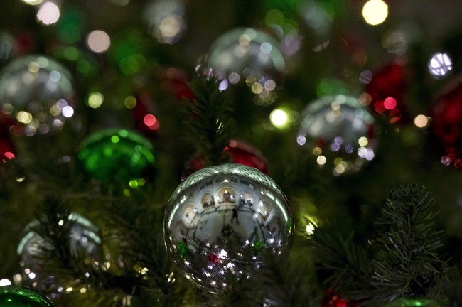 Christmas decorations adorn a tree.