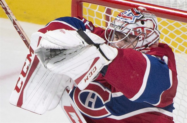 Montreal Canadiens goaltender Carey Price makes a save against the Toronto Maple Leafs during thrid period NHL hockey action in Montreal, Saturday, October 24, 2015.
