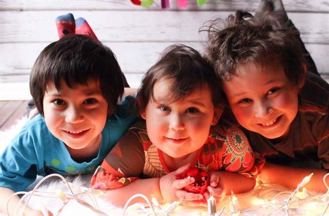 Harrison, Milly and Daniel Neville-Lake (left to right) are shown in a handout photo.