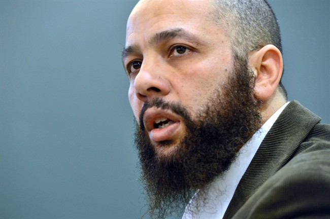 In this file photo, Adil Charkaoui attends a news conference in Montreal on February 27, 2015. harkaoui pleaded not guilty Friday to assault charges stemming from an alleged incident at a Montreal junior college. Friday, march 18, 2016.