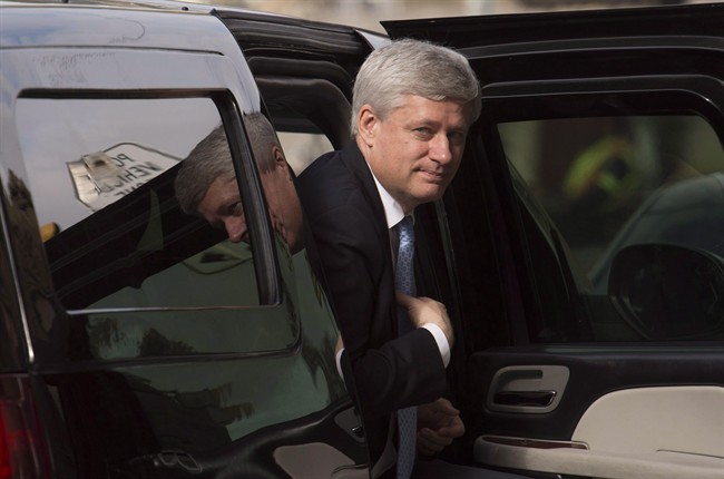 Outgoing prime minister Stephen Harper arrives at his Langevin office in Ottawa, Wednesday, Oct. 21, 2015. On his final day as prime minister, Harper reached out to a public service which his government had a tense relationship with for the last nine years.In a message sent to the entire government bureaucracy, he thanks them for the support they've shown his team over three successive Parliaments and for their dedication to the well-being of Canadians. THE CANADIAN PRESS/Adrian Wyld.