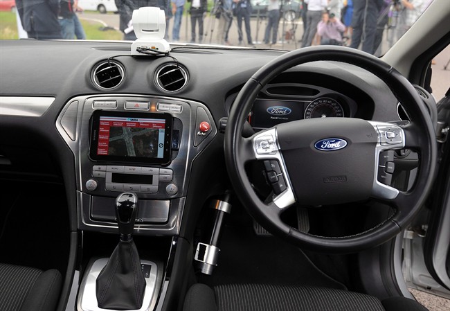 The interior of a driverless car during testing at the headquarters of motor industry research organization MIRA at Nuneaton in the West Midlands, England, Wednesday, July 30, 2014. 