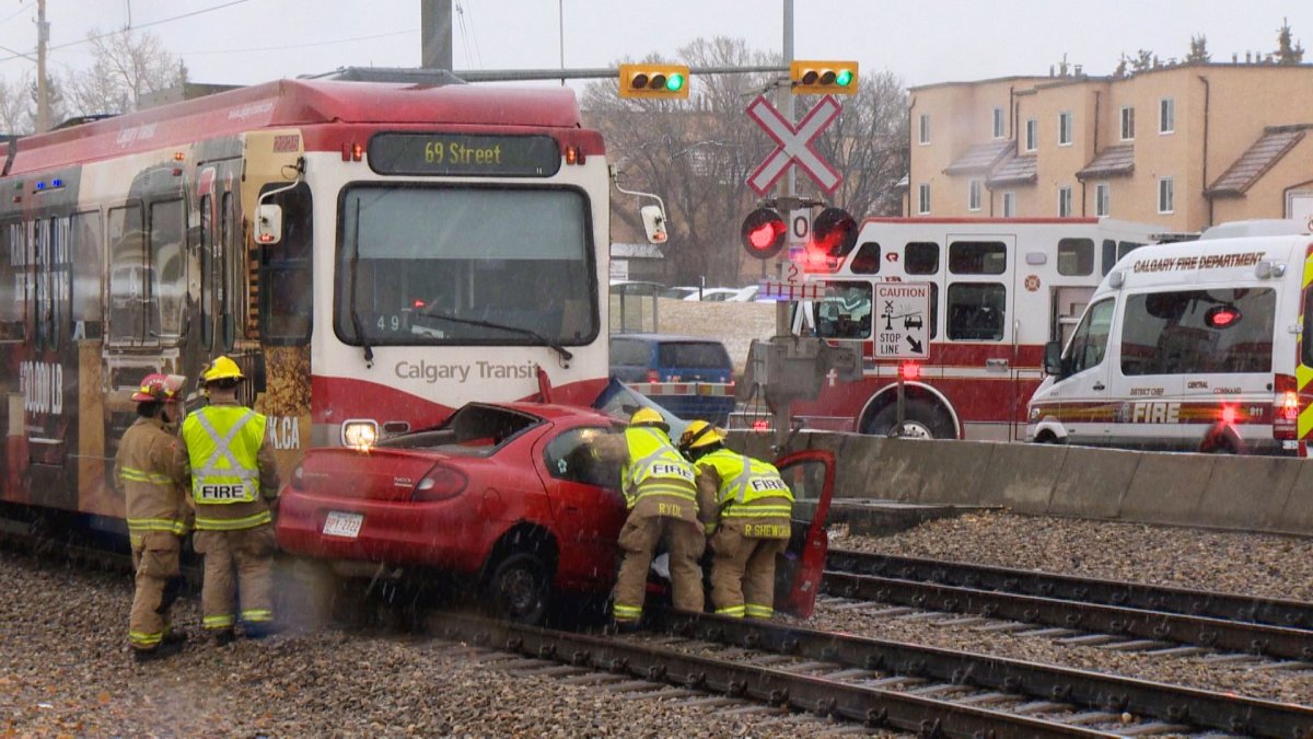 Emergency crews respond to collision between Ctrain and vehicle on the LRT tracks near 36 Street N.E. on Monday, Nov. 2, 2015.