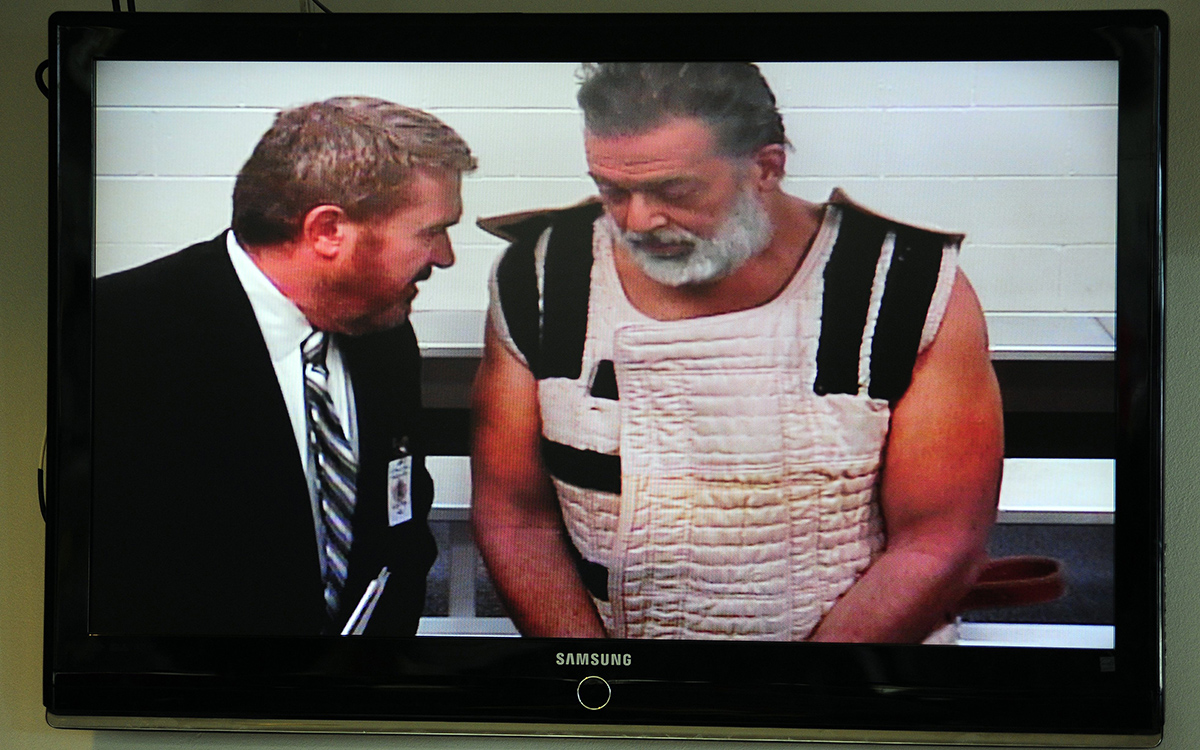 Colorado Springs shooting suspect, Robert Dear, right, appears via video before Judge Gilbert Martinez,  with public defender Dan King, at the El Paso County Criminal Justice Center for this first court appearance, where he was told he faces first degree murder charges, n Monday, Nov. 30, 2015, in Colorado Springs, Colo.