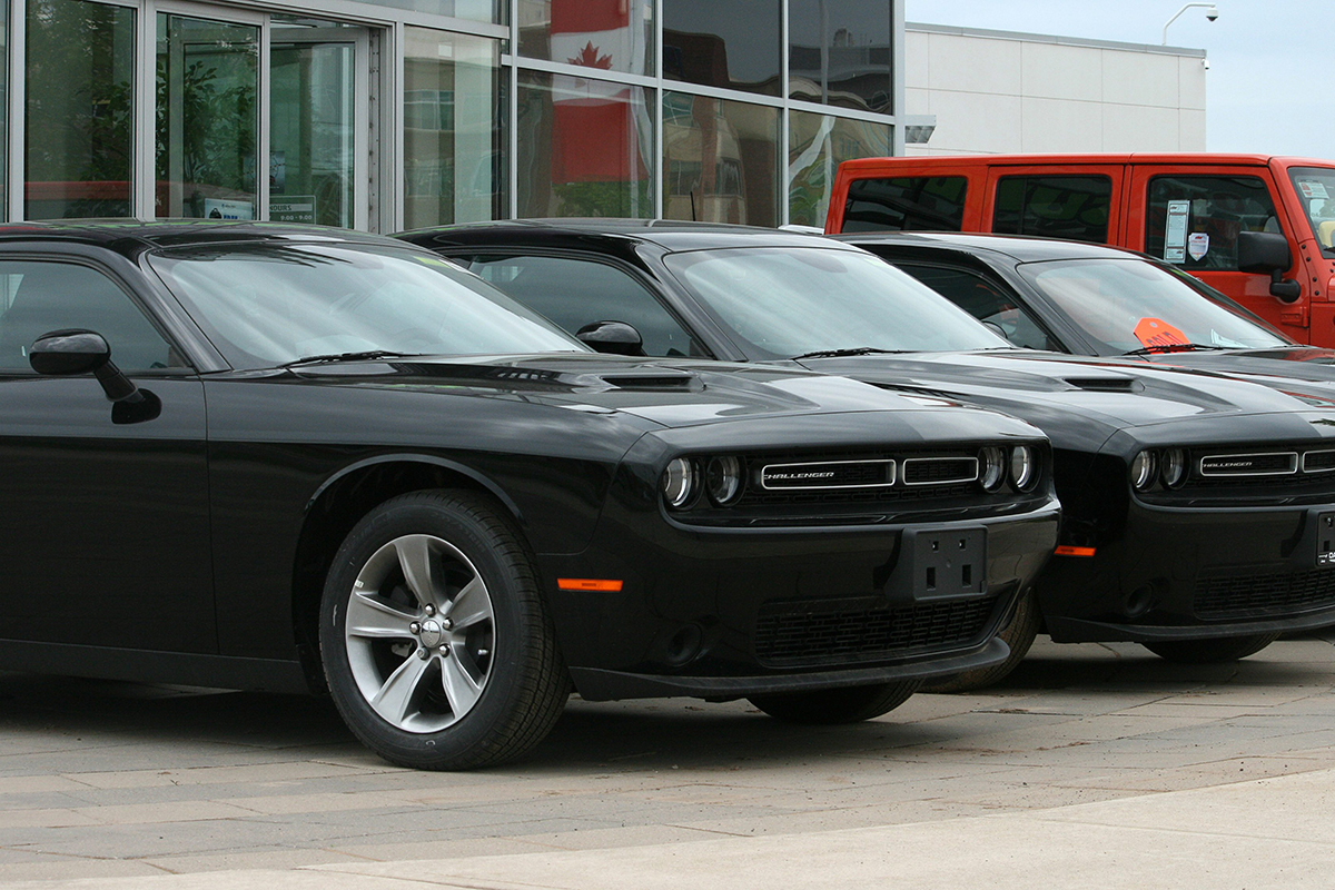 Dodge Challenger cars are on display at a  new car dealership in Oakville, Ont., Friday, May 15, 2015.