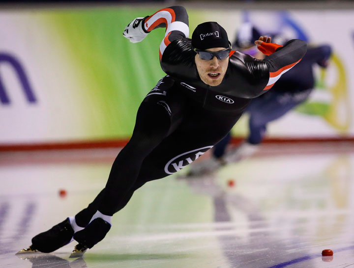 Saskatchewan’s Will Dutton skates to third place during the men's 500-metre competition at the ISU World Cup speed skating event in Calgary, Alta., Friday, Nov. 13, 2015.