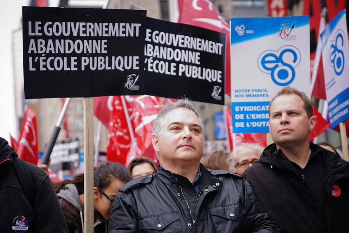 President of the FAE union Sylvain Mallette (centre) during a teacher strike, September 30, 2015.