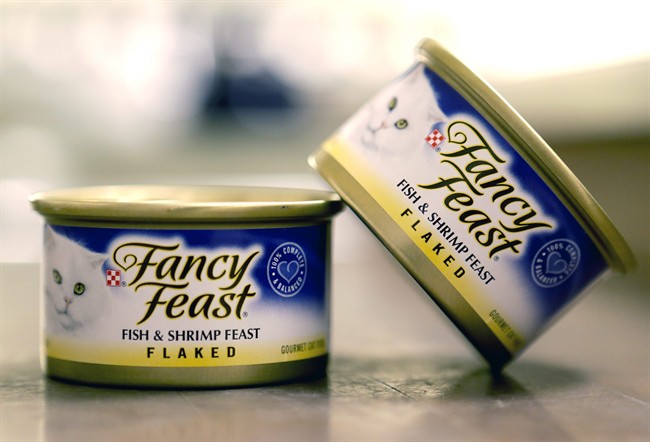 This Monday, Nov. 16, 2015, photo shows Fancy Feast cat food, fish and shrimp feast flavor, a product of Thailand, purchased at a Publix market in Orlando, Fla.