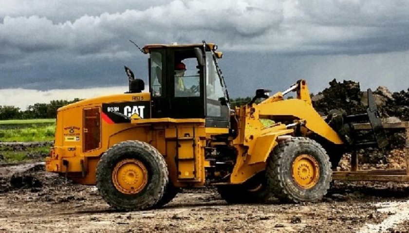 Police are searching for a stolen front end loader.