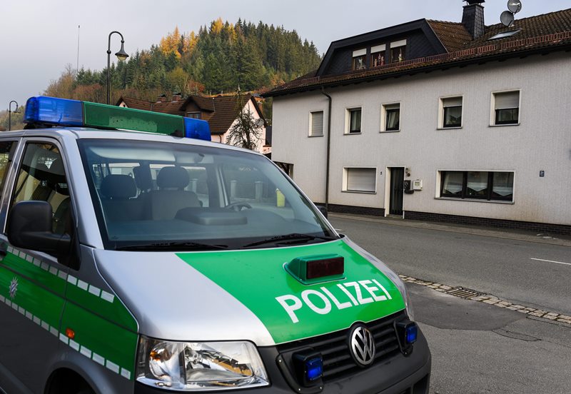 A police vehicle is parked opposite of a residential building in Wallenfels, Germany, 13 November 2015. The bodies of seven babies have been found at a home in the small German town, triggering a major police inquiry 13 November as investigators seek a 45-year-old woman for questioning. The bodies were found 12 November afternoon in a state of advanced decay. Pathologists are still to establish the infants' sexes and would look for more children among the remains. 
