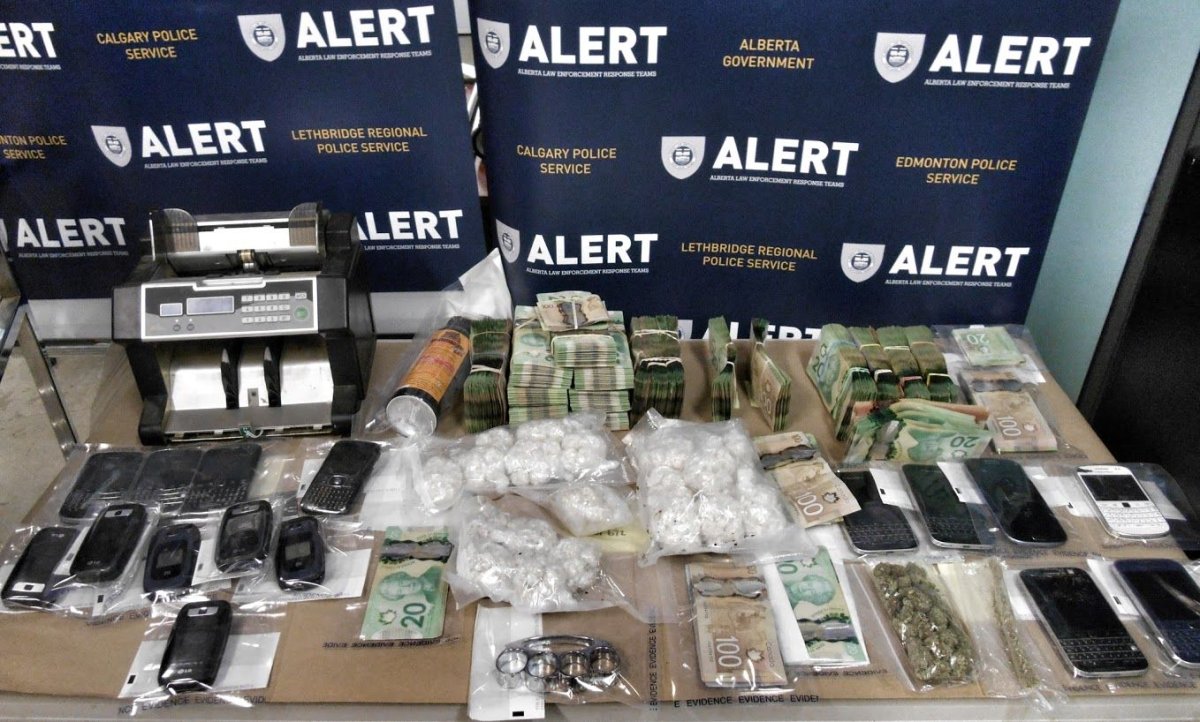 Police seize cash and cocaine during a drug bust in the Grande Prairie area, Tuesday, Nov. 24, 2015. 