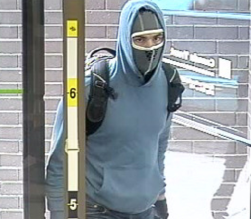 These photos were captured from surveillance video inside the bank.